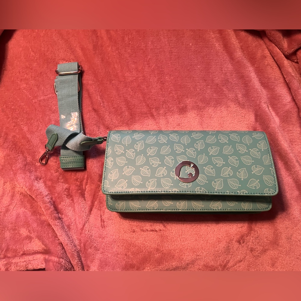 Animal Crossing Nintendo Switch Lite case. Never used, with strap.